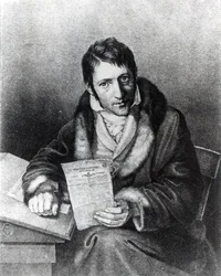 Charles-Joseph Panckoucke sosteniendo una copia de 